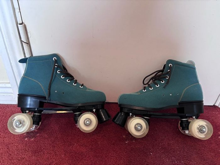 Teal suede roller skates