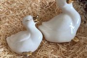 Vintage Pair of porcelain duck figurines.