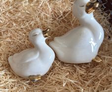 Vintage Pair of porcelain duck figurines.