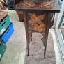 Antique Art Nouveau Table features intricate Pyrogravure Poker Work design around 1900 and arched supports Image 3