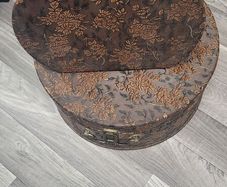 Vintage  embossed  hat  boxes