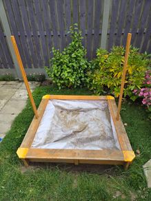 Sand pit with cover.