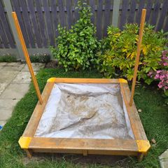 Sand pit with cover.