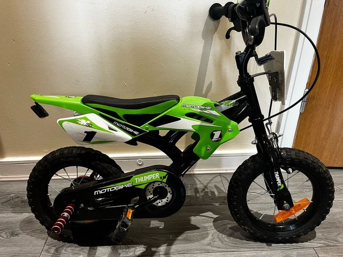 Boys green bike