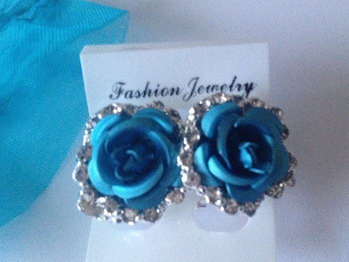 Brand new Turquoise / light blue Rose & Diamond earrings