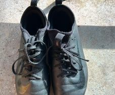 Almost new soccer boots.Studs slightly scraped perfect for soccer games