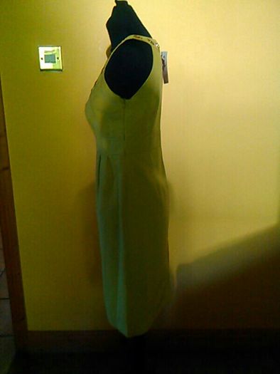 Brand new dress with special neck details.