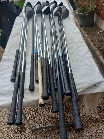 A selection of golf clubs and bags. NOT SELLING SEPARATE