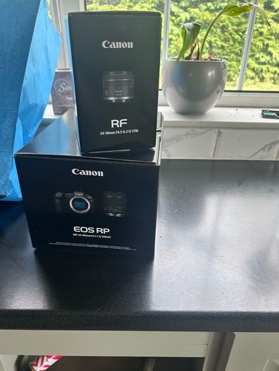 canon Camera EOS RP with 24-50 mm F4.5-6.3 IS STM. This camera has literally never been used!. My daughter bought it in Conns Cameras in Dublin City and NEVER used it. Camera and lens comes with original boxes ( as new) and the shopping bag. Camera also c