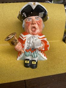 Wedgewood toby jug number750"Town Crier" Some paint on hat area see photos. Height 15cm
