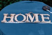 Large HOME sign