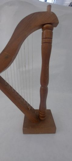 handcrafted wooden display harp ,,lovely display item for any man cave pub restaurant etc etc etc, buyer collects or pays postage.