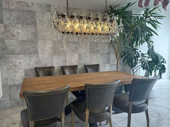 Dining table on the chair,  chandelier light