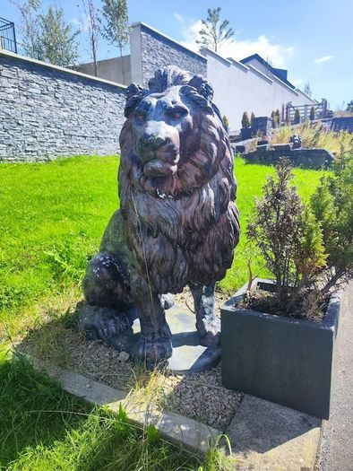 Large Stone Sitting Lions Pair