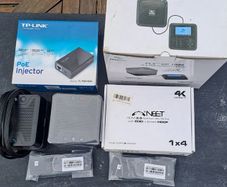 A collection of Conference Phone, Remotes, Splitter