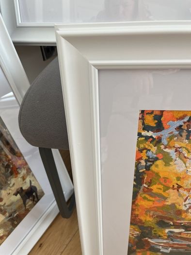 framed painting on canvas