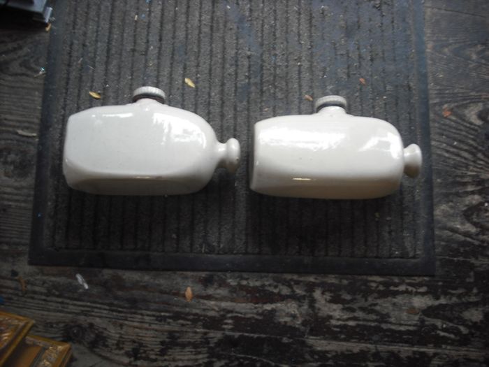 a 2 antique hot water  bottles or foot warmer