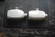 a 2 antique hot water  bottles or foot warmer