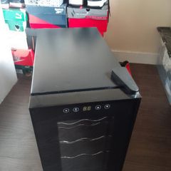 wine cooler fridge 8 bottle capacity.