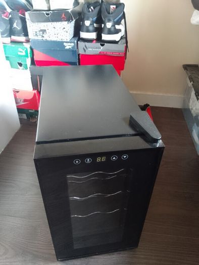 wine cooler fridge 8 bottle capacity.