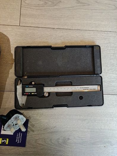 Grinder and digital caliper