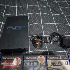 playstation 2 (no power) all cables + games