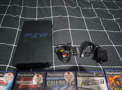 playstation 2 (no power) all cables + games
