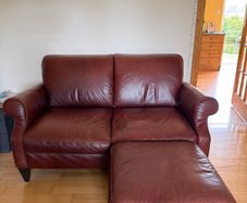 Genuine Leather 2 seater sofa w/ matching pouffe