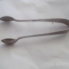 a antique solid silver suger tons or nips