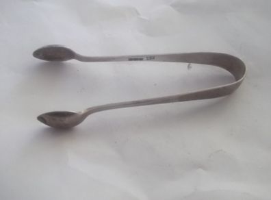 a antique solid silver suger tons or nips