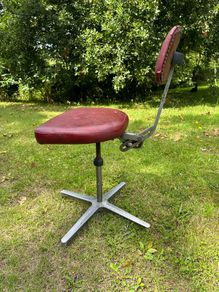 Vintage red swivel and tilt office chair
