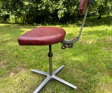Vintage red swivel and tilt office chair