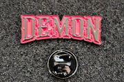 Demon , pin back badge.
