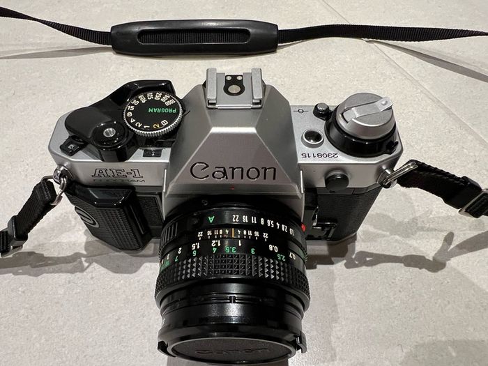 1984 Canon AE-1 Program Film Camera + Sigma zoom lens +Vivitar flash