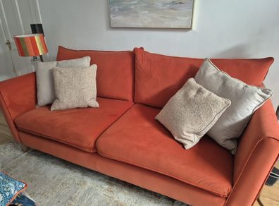 Burnt orange sofa