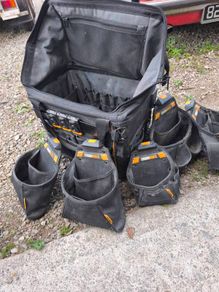 tough built rolling tool bag with various pouches