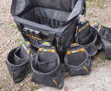 tough built rolling tool bag with various pouches