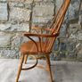 A large oak Windsor armchair. Image 9
