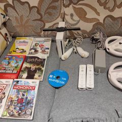 Wii bundle with Mario Kart, Mario Bros, Sports