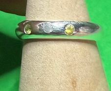 Handmade sterling silver flush set white and yellow stones. Size N