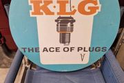 KLG plugs sign