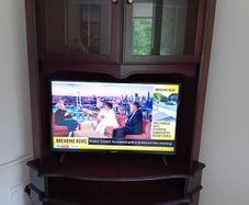 Tall corner TV cabinet