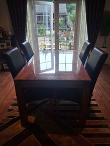 Stunning table and 4 leather chairs and matching units