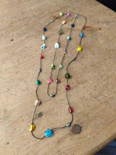 handmade funky necklace featuring a variety of colourful glass and stone beads