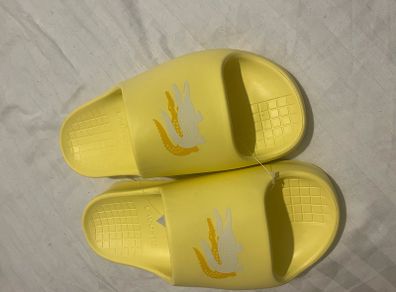 Brand new Unisex Lacoste slider- size 7