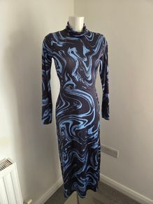 New with tags. Warehouse Size 8 marble print roll neck dress.