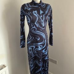 New with tags. Warehouse Size 8 marble print roll neck dress.