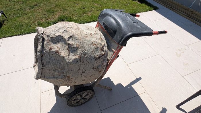 Petrol cement mixer with stand