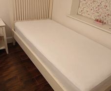 Single white bed