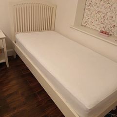 Single white bed